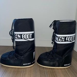 Black and white Moon Boots